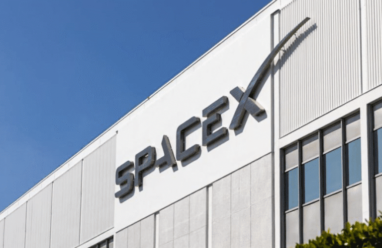 SpaceX rocket launching at night