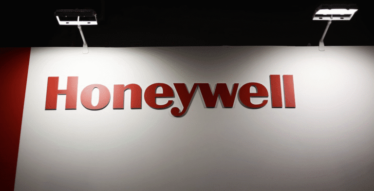 Laptop displaying stock market chart illustrating Honeywell Oracle earnings results
