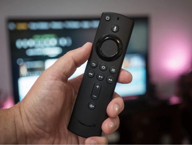 A hand holding a streaming remote in front of a TV home screen with an error message about a disconnected remote